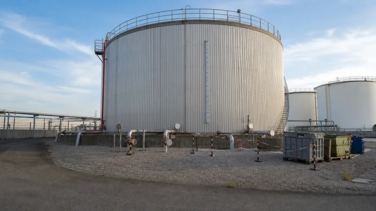 Above-ground storage tank isolated and fenced as part of a controlled decommissioning project